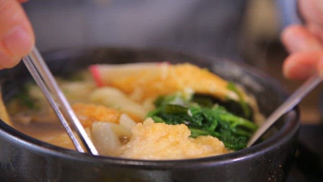 Bowl of udon with tempura and vegetables