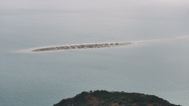 White Sandbank in the Middle of the Sea