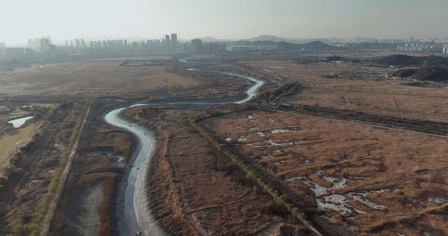 A winding river through a vast landscape