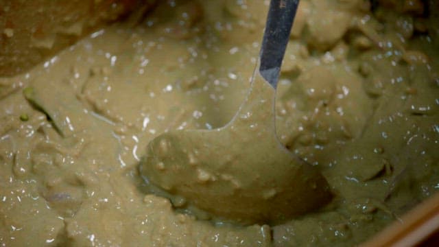 Traditional fermented food made with leaven, shindari, is scooped out with a ladle and placed in a bowl