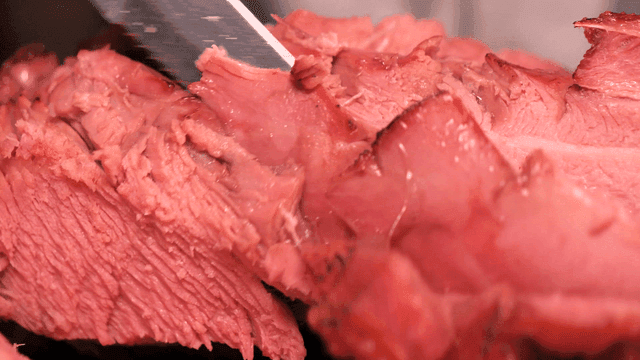 Well-cooked turkey leg being roasted