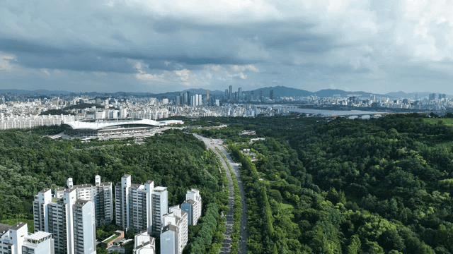 Cityscape with stadiums and greenery