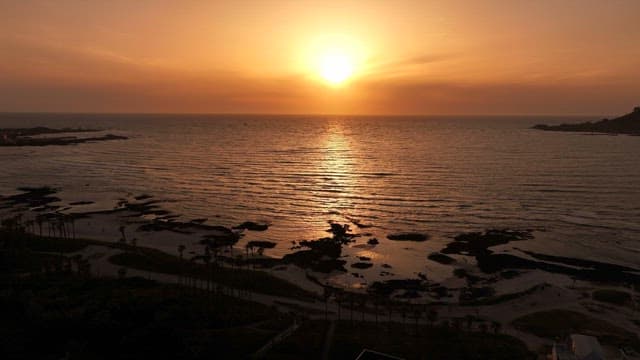 Sunset over a tranquil ocean