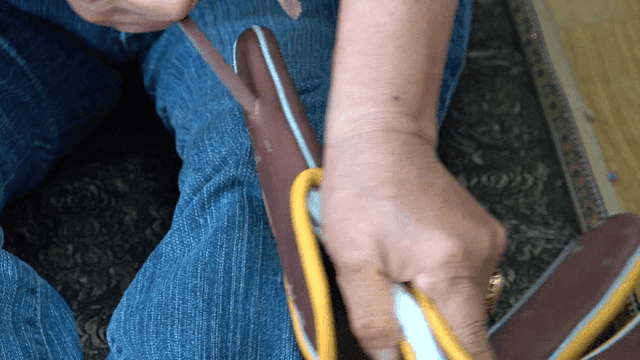 Artisan threading leather glove strap