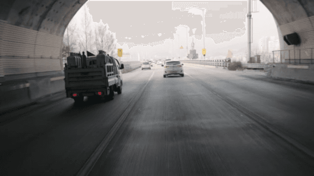Cars running through tunnels and over bridges