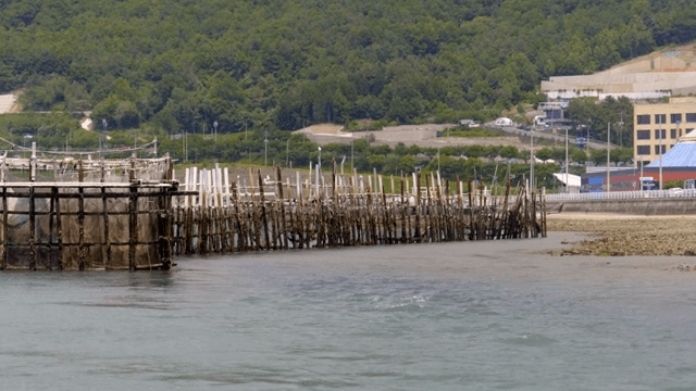 Coastal aquaculture structures by the sea