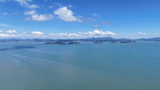 Vast ocean with distant islands