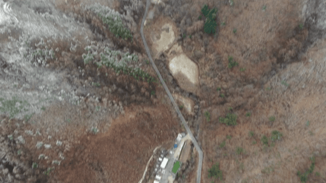 Snow-covered mountains and winding roads