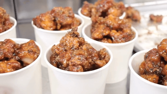 Deep-fried and braised chicken in a paper cup