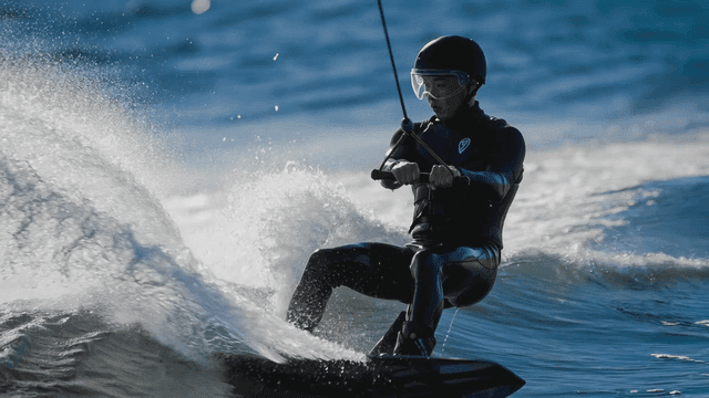 People who wakeboard in ocean