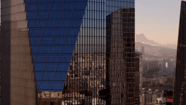 Modern skyscrapers reflecting the cityscape