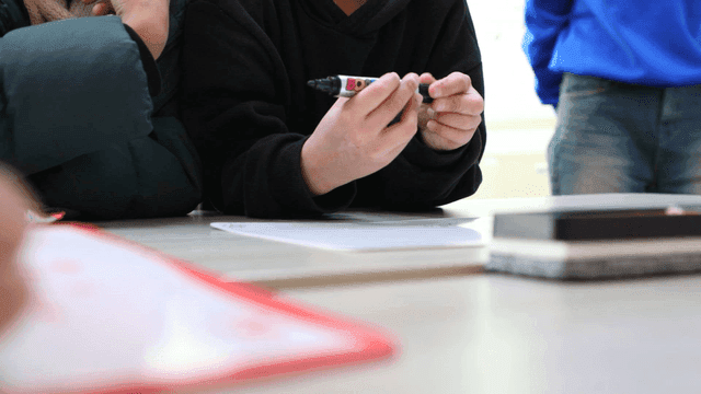 Elementary school students solving problems together