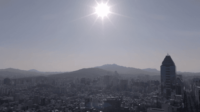 City skyline under bright sun