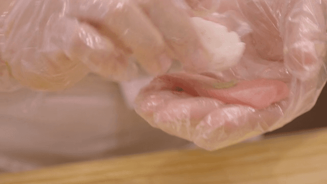 Sushi being prepared with precision