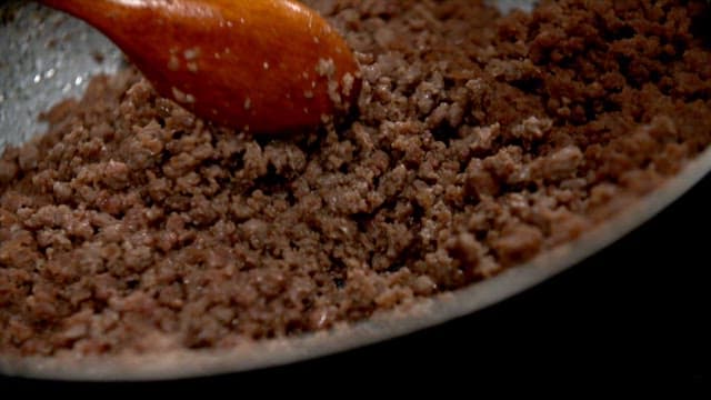 Ground beef being cooked in a pan