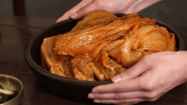 Kimchi stew served on dining table