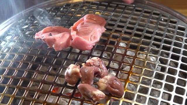 Special cuts of chicken grilled on a grill