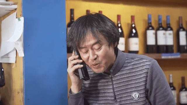 Man making a phone call with a happy expression