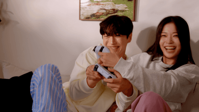 Couple enjoying video games at home