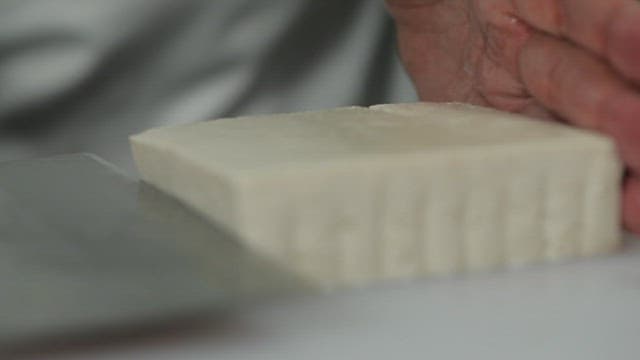 Slicing tofu with a knife