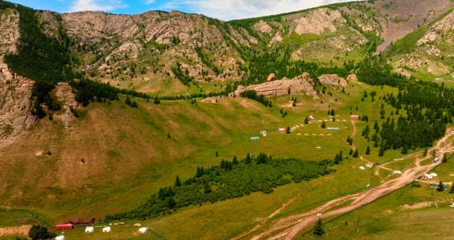 Vast mountainous landscape with greenery