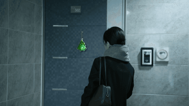 Young woman leaving her home