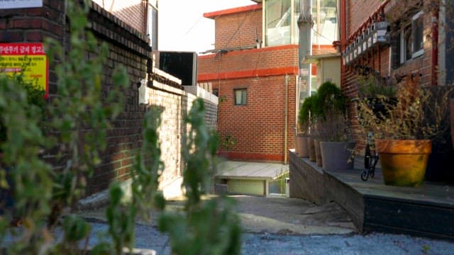 Quiet alley with brick buildings