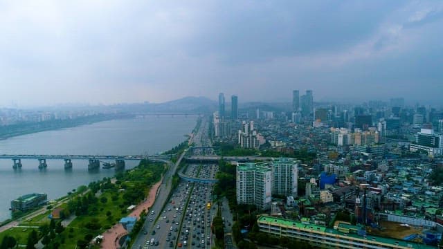 Scenery of a Bustling Metropolis Under a Cloudy Sky