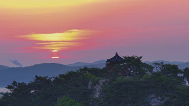 Sunset view with an old pavilion