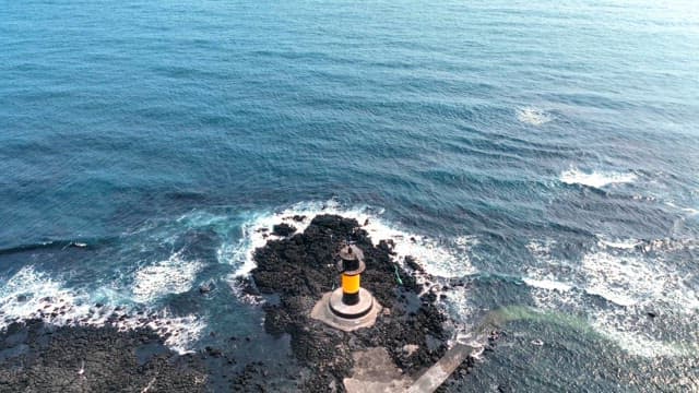 Lighthouse on a rocky coastline