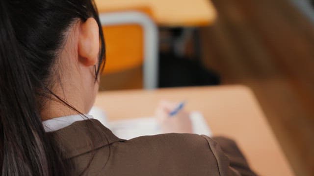 Student studying in a classroom