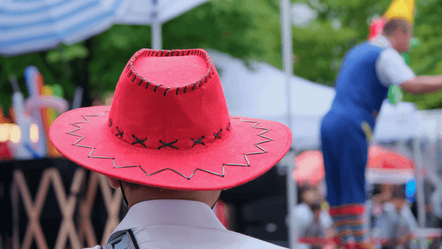 A performer in a colorful outfit on stage