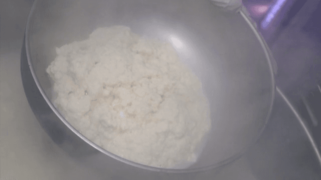 Soft bean curd transferred to a bowl