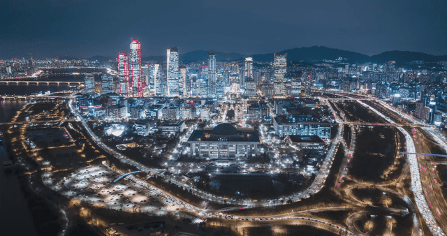 Vibrant city skyline at night government buildings