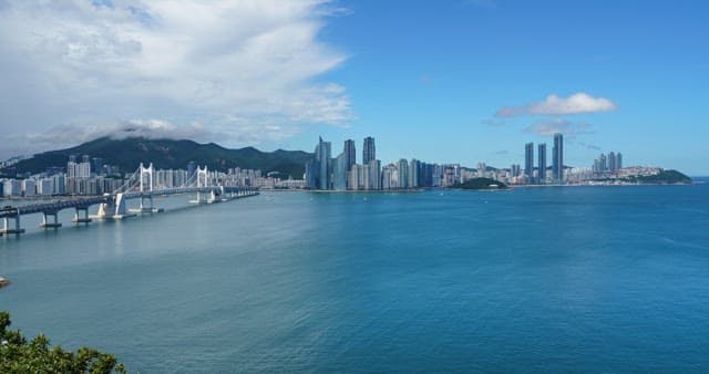 Clear day, coastal city Busan and calm sea scenery