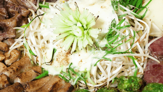 Korean barbecue with vegetables and sauces