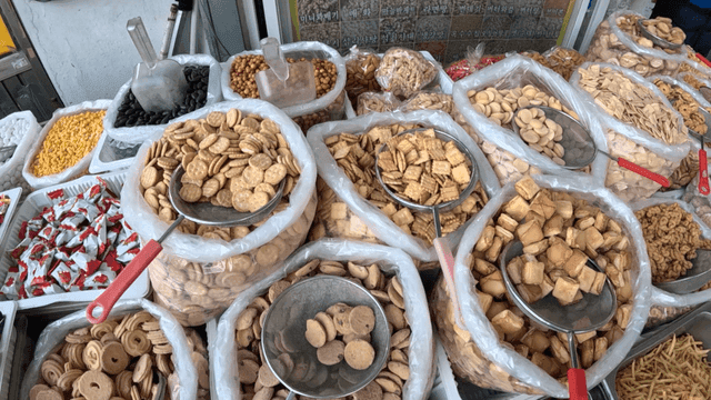Various snacks displayed in a market