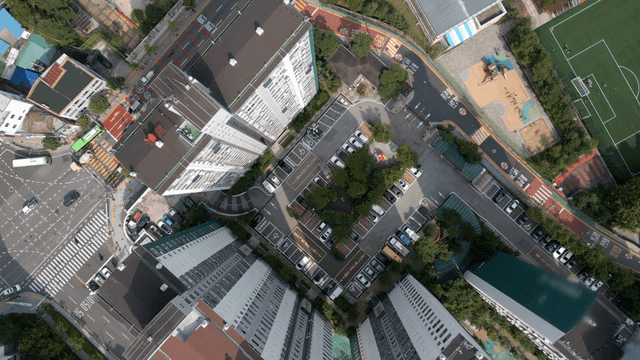 Aerial view of a city with tall buildings