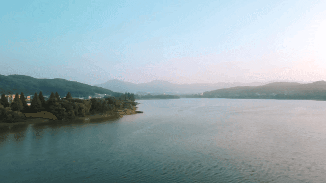 Tranquil lake surrounded by mountains