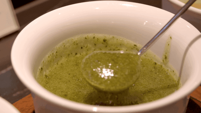 Herb sauce in white bowl