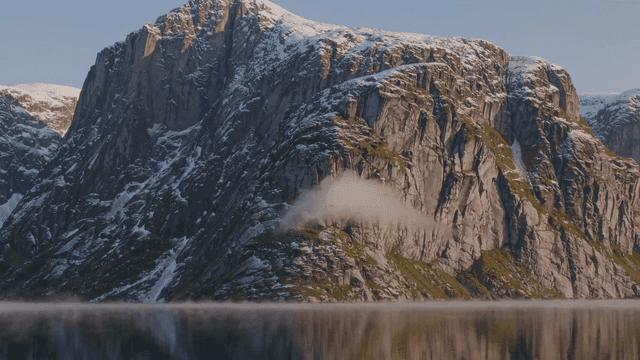 Majestic mountain with snow and clouds