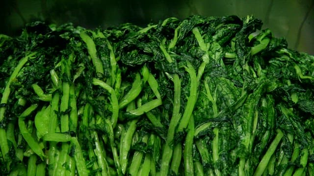 Fresh green vegetables in a container