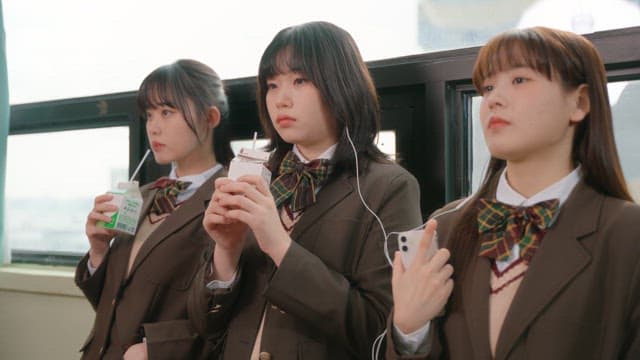 Students taking a break and drinking milk in the classroom