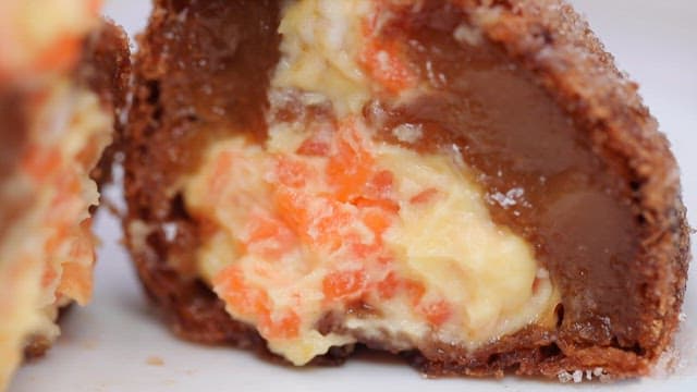 Close-up of a dessert with cream and carrot filling