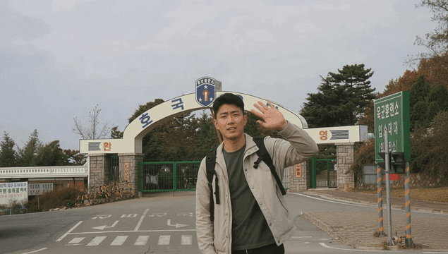 Young man greeting at entrance to training center