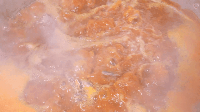 Spicy pork backbone stew boiling in pot