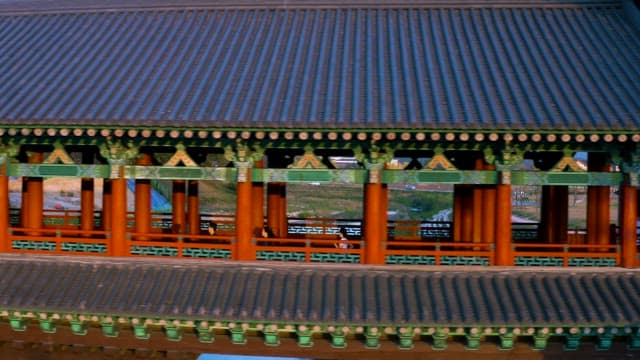 People Running Along Woljeong Bridge