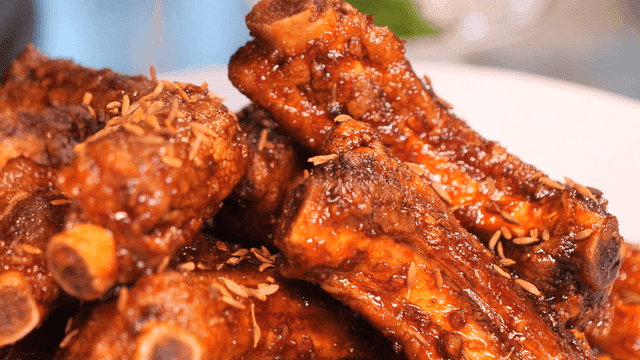 Moist glazed marinated ribs on plate