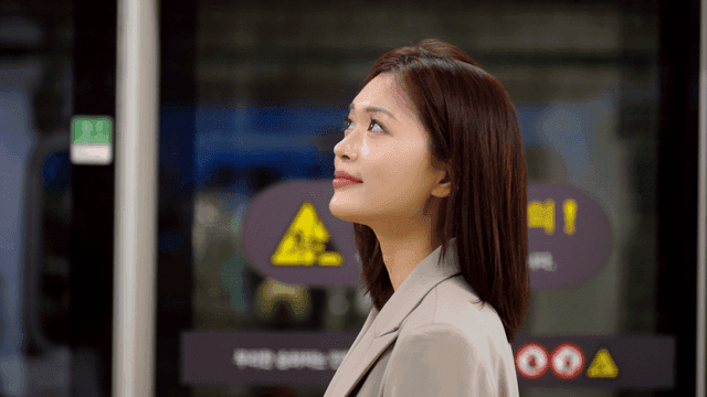 Working woman waiting at subway station