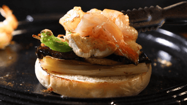 Shrimp and vegetables on a bun